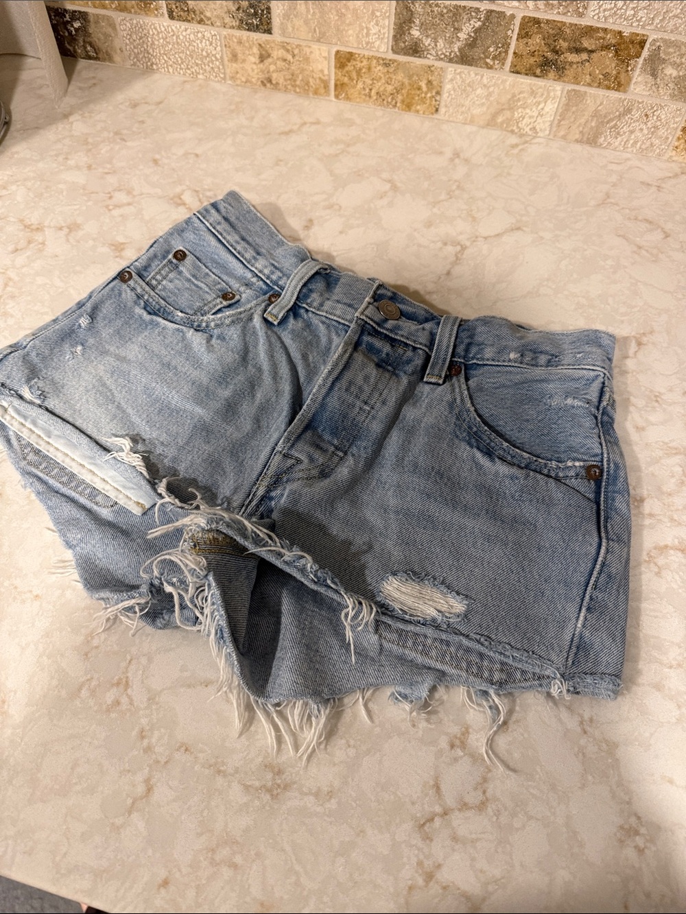 Levi's Light Blue Distressed Denim Cutoff Shorts